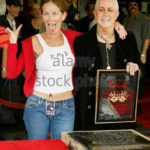 Grace Slick, lead singer of rock groups "Jefferson Airplane," "Jefferson Starship," and "Starship," poses with her daughter China Kantner (L) after Slick's induction into Hollywood's Rock Walk, October 22, 2002 in Hollywood. Slick, best known for her song "White Rabbit," was one of the first female rock stars in the 1960's and 1970's and currently devotes her time to painting. REUTERS/Fred Prouser FSP/HB